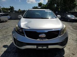 2013 Kia Sportage LX with VIN KNDPB3A26D7429389, listed as a Copart auction lot 50597295 with 217,197 mi miles and Salvage Title. Bid and sale history available at carsss.com. Image 5.