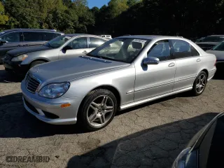 2006 Mercedes-Benz S-Class 5.0L with VIN WDBNG75J06A483468, listed as a Copart auction lot 74418814 with 36,623 mi miles and Salvage Title. Bid and sale history available at carsss.com. Image 1.