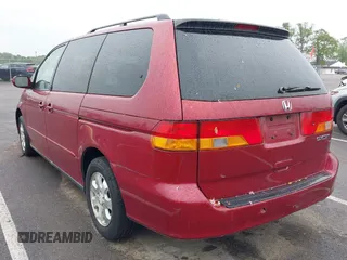2003 Honda Odyssey EX-L with VIN 5FNRL18993B009180, listed as a IAAI auction lot 42224572 with 187,781 mi miles and . Bid and sale history available at DreamBid. Image 3.
