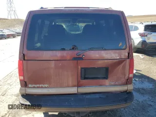 1999 GMC Safari with VIN 1GKEL19W2XB506085, listed as a Copart auction lot 45527785 with 213,594 mi miles and Salvage Title. Bid and sale history available at carsss.com. Image 6.