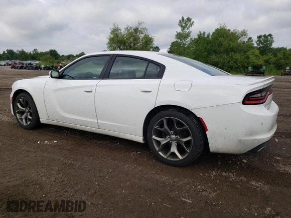 2015 Dodge Charger SXT with VIN 2C3CDXHG4FH832400, listed as a Copart auction lot 61493795 with 134,582 mi miles and Salvage title. Bid and sale history available at DreamBid. Image 2.