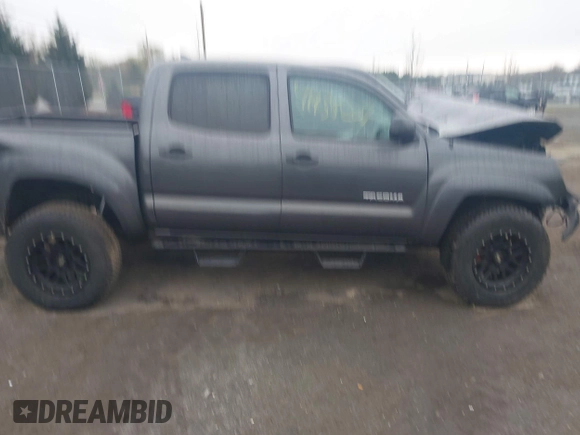 2012 Toyota Tacoma z VIN 3TMLU4EN9CM095110, wystawiony jako IAAI lot #41935207 z przebiegiem 177 543 mil mil oraz . Historia ofert i sprzedaży dostępna na DreamBid. Obrazek 13.