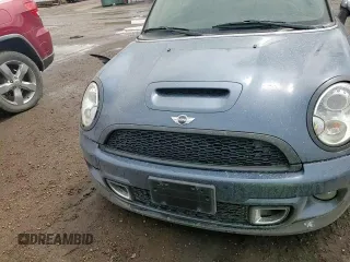 2011 MINI Convertible S z VIN WMWZP3C52BTX84305, wystawiony jako Copart lot #59586995 z przebiegiem 36 217 mil mil oraz Szkoda całkowita • Salvage title. Historia ofert i sprzedaży dostępna na DreamBid. Obrazek 13.