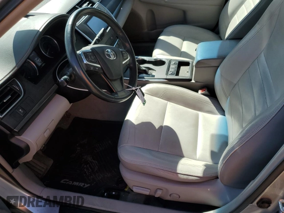 2015 Toyota Camry LE with VIN 4T1BD1FKXFU156118, listed as a Copart auction lot 52772745 with 129,600 mi miles and Salvage Title. Bid and sale history available at DreamBid. Image 7.