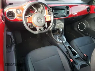 2012 Volkswagen Beetle 2.5L PZEV with VIN 3VWJP7AT0CM601196, listed as a Copart auction lot 44962065 with 128,597 mi miles and Salvage Title. Bid and sale history available at carsss.com. Image 8.