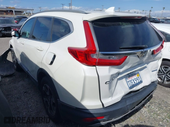 2017 Honda CR-V Touring with VIN 2HKRW1H96HH517669, listed as a IAAI auction lot 41653040 with 97,961 mi miles. Bid and sale history available at carsss.com. Image 3.