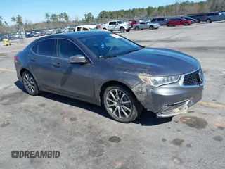 2018 Acura TLX with VIN 19UUB2F39JA010256, listed as a IAAI auction lot 41643330 with 164,543 mi miles and . Bid and sale history available at DreamBid. Image 1.