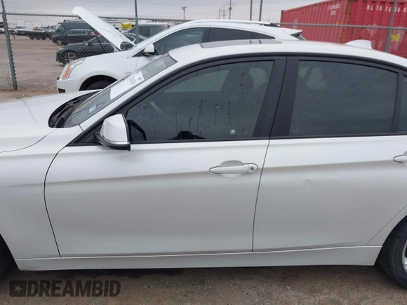 2015 BMW 3 Series 320i with VIN WBA3B1C5XFK140734, listed as a IAAI auction lot 42141319 with 84,863 mi miles and . Bid and sale history available at DreamBid. Image 14.