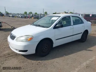 2007 Toyota Corolla CE with VIN 1NXBR32E87Z897396, listed as a IAAI auction lot 42044058 with 299,999 mi miles. Bid and sale history available at carsss.com. Image 2.