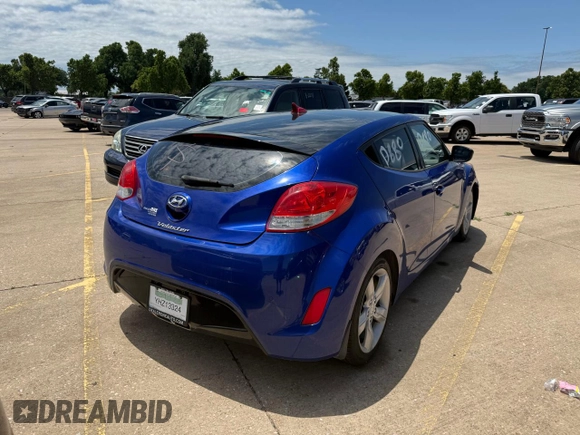 2013 Hyundai Veloster w/Black Int z VIN KMHTC6AD1DU094781, wystawiony jako Copart lot #60271115 z przebiegiem 122 541 mil mil oraz Szkoda całkowita • Salvage title. Historia ofert i sprzedaży dostępna na DreamBid. Obrazek 4.
