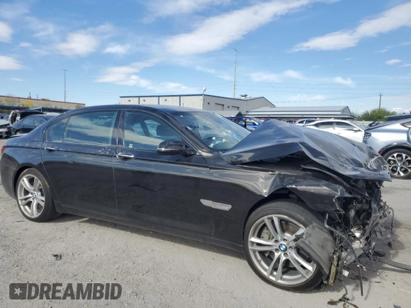 2015 BMW 7 Series 750Li with VIN WBAYE8C59FD781223, listed as a Copart auction lot 54944265 with 125,203 mi miles and Salvage title. Bid and sale history available at DreamBid. Image 4.