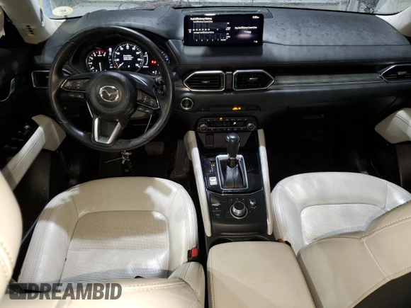 2021 Mazda CX-5 Grand Touring with VIN JM3KFADM5M0428282, listed as a Copart auction lot 42567825 with 33,763 mi miles and Salvage Title. Bid and sale history available at carsss.com. Image 8.