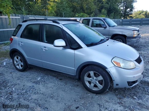 2011 Suzuki SX4 Crossover with VIN JS2YB5A34B6301816, listed as a Copart auction lot 69977294 with 103,248 mi miles and Salvage Title. Bid and sale history available at carsss.com. Image 4.