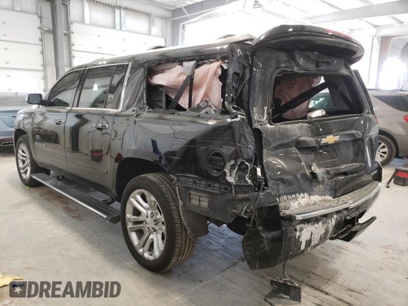 2019 Chevrolet Suburban Premier with VIN 1GNSKJKJ8KR302849, listed as a Copart auction lot 87717275 with 69,498 mi miles and Salvage Title. Bid and sale history available at DreamBid. Image 2.