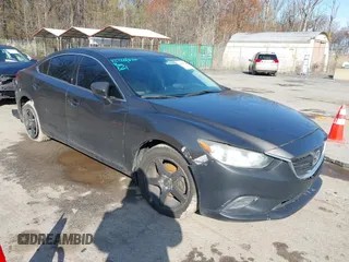 2016 Mazda 6 i Sport with VIN JM1GJ1U59G1402840, listed as a IAAI auction lot 41920724 with 147,527 mi miles and . Bid and sale history available at DreamBid. Image 1.