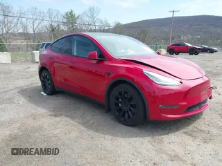 2021 Tesla Model Y Long Range with VIN 5YJYGDEE0MF209191, listed as a IAAI auction lot 41937507 with 56,131 mi miles. Bid and sale history available at carsss.com. Image 1.