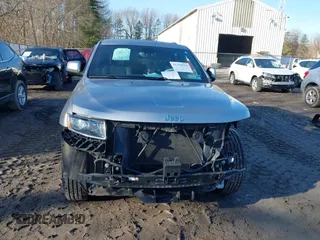 2015 Jeep Grand Cherokee Laredo with VIN 1C4RJFAG9FC775004, listed as a IAAI auction lot 41754534 with 116,893 mi miles. Bid and sale history available at carsss.com. Image 12.