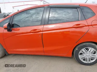 2020 Honda Fit LX z VIN 3HGGK5H45LM710897, wystawiony jako IAAI lot #41815222 z przebiegiem 100 304 mil mil oraz . Historia ofert i sprzedaży dostępna na DreamBid. Obrazek 14.