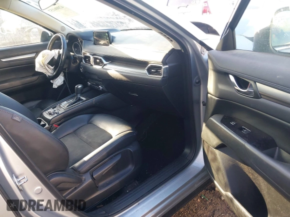 2020 Mazda CX-5 Touring with VIN JM3KFACM5L0766698, listed as a IAAI auction lot 42006157 with 80,288 mi miles and . Bid and sale history available at carsss.com. Image 5.
