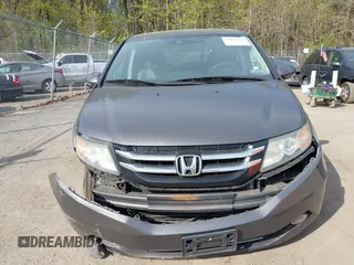 2014 Honda Odyssey Touring with VIN 5FNRL5H92EB073085, listed as a IAAI auction lot 42065913 with 120,834 mi miles and . Bid and sale history available at DreamBid. Image 12.