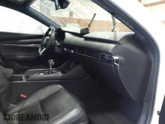 2021 Mazda 3 Premium with VIN JM1BPBML6M1348258, listed as a IAAI auction lot 42752477 with 35,285 mi miles and . Bid and sale history available at DreamBid. Image 5.