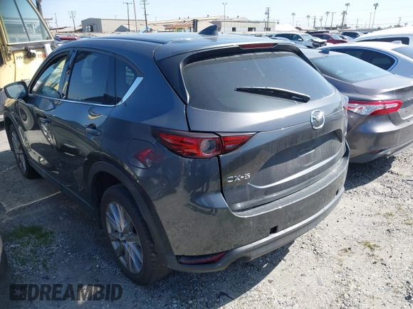2020 Mazda CX-5 Grand Touring with VIN JM3KFADM7L0766278, listed as a IAAI auction lot 41297902 with 1 mi miles. Bid and sale history available at carsss.com. Image 3.