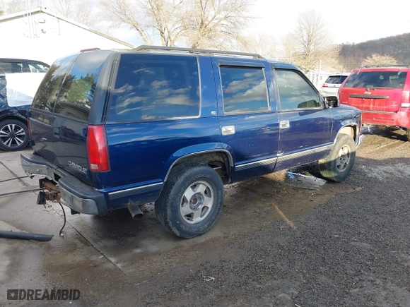 1998 Chevrolet Tahoe with VIN 1GNEK13RXWJ372276, listed as a IAAI auction lot 41458359 with 229,582 mi miles. Bid and sale history available at carsss.com. Image 4.