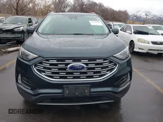 2022 Ford Edge SEL z VIN 2FMPK4J90NBA71360, wystawiony jako IAAI lot #41724316 z przebiegiem 35 309 mil mil oraz . Historia ofert i sprzedaży dostępna na DreamBid. Obrazek 13.