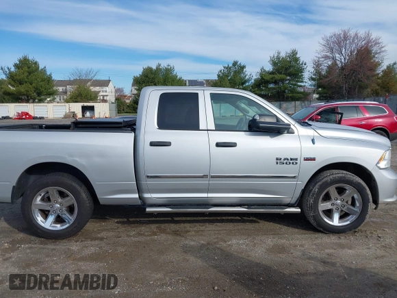 2014 Ram 1500 Express z VIN 1C6RR7FTXES136971, wystawiony jako IAAI lot #41845334 z przebiegiem 94 893 mil mil oraz . Historia ofert i sprzedaży dostępna na DreamBid. Obrazek 13.