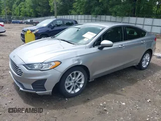2020 Ford Fusion SE with VIN 3FA6P0HD5LR262877, listed as a IAAI auction lot 42243525 with 53,071 mi miles and . Bid and sale history available at DreamBid. Image 2.