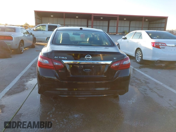2018 Nissan Altima SR with VIN 1N4AL3AP7JC129741, listed as a IAAI auction lot 40923554 with 161,218 mi miles and . Bid and sale history available at carsss.com. Image 16.