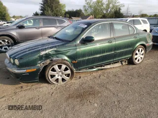 2004 Jaguar X-Type z VIN SAJEA51C04WD65097, wystawiony jako Copart lot #53825295 z przebiegiem 58 270 mil mil oraz Szkoda całkowita • Salvage title. Historia ofert i sprzedaży dostępna na DreamBid. Obrazek 1.