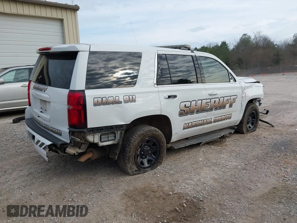 2020 Chevrolet Tahoe Commercial with VIN 1GNLCDEC7LR199179, listed as a IAAI auction lot 41502623 with 87,271 mi miles and . Bid and sale history available at DreamBid. Image 4.