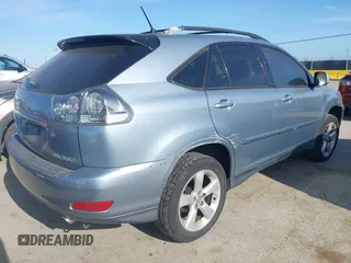 2005 Lexus RX 330 with VIN JTJHA31U450080748, listed as a IAAI auction lot 42095171 with 215,937 mi miles. Bid and sale history available at carsss.com. Image 4.