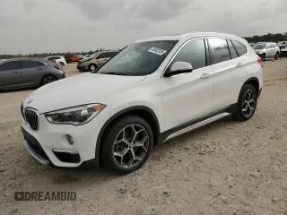 2019 BMW X1 sDrive28i with VIN WBXHU7C57K3H44192, listed as a Copart auction lot 49882335 with 79,350 mi miles and Salvage Title. Bid and sale history available at carsss.com. Image 1.