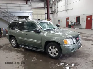 2004 GMC Envoy SLE with VIN 1GKDT13S842295715, listed as a IAAI auction lot 41602246 with 162,119 mi miles. Bid and sale history available at carsss.com. Image 1.