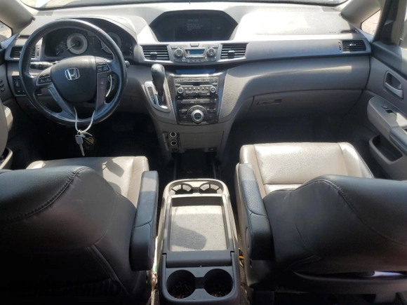 2013 Honda Odyssey Touring with VIN 5FNRL5H99DB052538, listed as a Copart auction lot 66310875 with 192,052 mi miles and Clean title. Bid and sale history available at DreamBid. Image 8.
