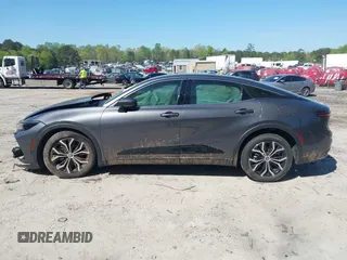 2023 Toyota Crown XLE с VIN JTDAAAAF7P3010236, выставлен на аукционе IAAI как лот 42008655 с пробегом 28 073 миль миль и . История ставок и продаж доступна на DreamBid. Изображение 13.