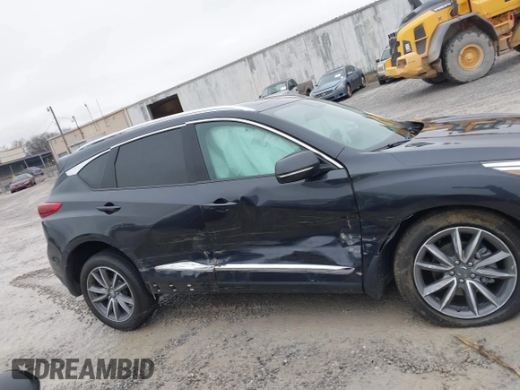 2020 Acura RDX Technology with VIN 5J8TC2H50LL003615, listed as a IAAI auction lot 41427217 with 61,952 mi miles and . Bid and sale history available at DreamBid. Image 13.
