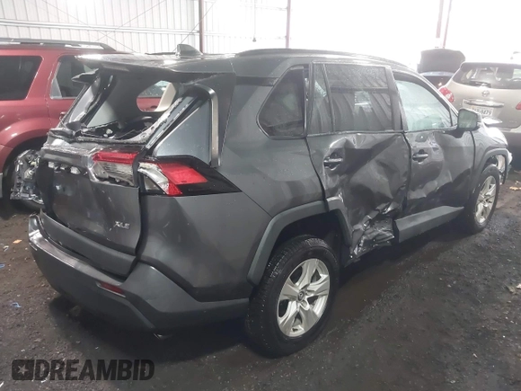 2021 Toyota RAV4 XLE with VIN 2T3W1RFVXMW117830, listed as a IAAI auction lot 41865708 with 94,990 mi miles. Bid and sale history available at carsss.com. Image 4.