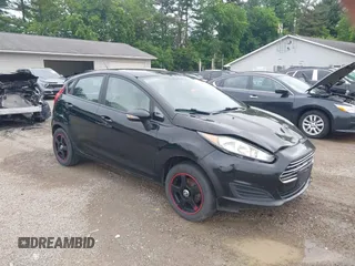 2016 Ford Fiesta SE z VIN 3FADP4EJXGM154072, wystawiony jako IAAI lot #42366219 z przebiegiem 155 506 mil mil oraz . Historia ofert i sprzedaży dostępna na DreamBid. Obrazek 1.