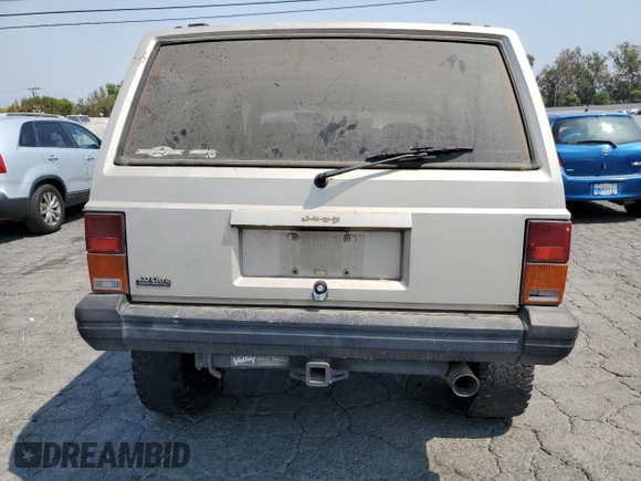 1996 Jeep Cherokee Sport with VIN 1J4FJ68S4TL146513, listed as a Copart auction lot 71039984 with 330,765 mi miles and Clean Title. Bid and sale history available at carsss.com. Image 6.