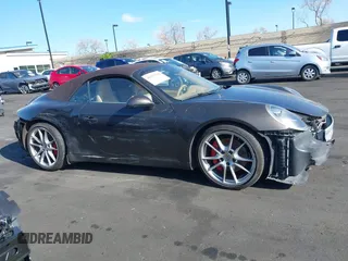 2012 Porsche 911 Carrera S with VIN WP0CB2A98CS154934, listed as a IAAI auction lot 41871101 with 69,411 mi miles and . Bid and sale history available at DreamBid. Image 14.