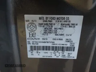 2011 Ford F-150 XL with VIN 1FTEX1EM4BFB73765, listed as a IAAI auction lot 41292186 with 128,334 mi miles. Bid and sale history available at carsss.com. Image 9.