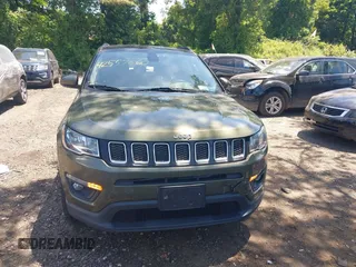 2018 Jeep Compass Latitude with VIN 3C4NJDBB5JT200840, listed as a IAAI auction lot 42557660 with 39,489 mi miles and . Bid and sale history available at DreamBid. Image 12.