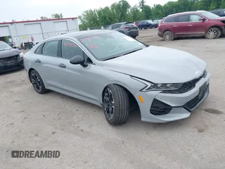 2023 Kia K5 GT-Line z VIN 5XXG64J24PG193136, wystawiony jako IAAI lot #42395770 z przebiegiem 27 163 mil mil oraz . Historia ofert i sprzedaży dostępna na DreamBid. Obrazek 1.