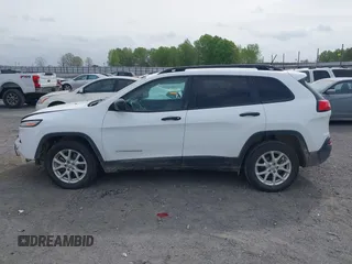 2017 Jeep Cherokee Sport z VIN 1C4PJLAB1HW640613, wystawiony jako IAAI lot #41930511 z przebiegiem 101 154 mil mil oraz . Historia ofert i sprzedaży dostępna na DreamBid. Obrazek 14.