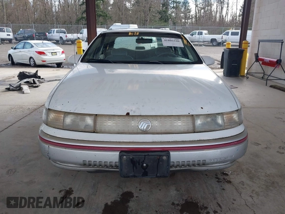 1992 Mercury Sable z VIN 1MECM5049NG647978, wystawiony jako IAAI lot #41805346 z przebiegiem 23 634 mil mil oraz . Historia ofert i sprzedaży dostępna na DreamBid. Obrazek 12.