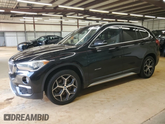 2018 BMW X1 xDrive28i with VIN WBXHT3C32J5F89449, listed as a Copart auction lot 64896595 with 108,804 mi miles and Clean title. Bid and sale history available at DreamBid. Image 1.