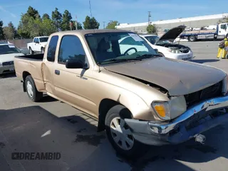 1999 Toyota Tacoma with VIN 4TAVL52N1XZ564860, listed as a IAAI auction lot 42012599 with 268,687 mi miles and . Bid and sale history available at DreamBid. Image 1.